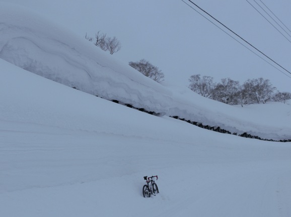 K's bike and the anti-avalanche fences